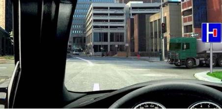 Is the driver of a bus continuing straight ahead required to give way to a truck?