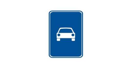 Which vehicles are allowed to drive on the road on which this sign is placed?