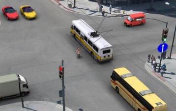 In this situation, does the bus driver have the right to travel straight?